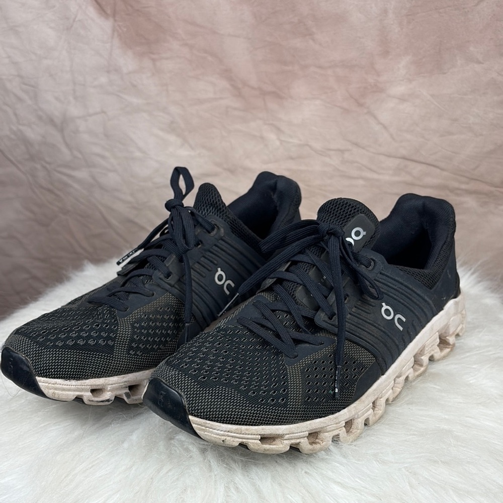 On Running Black and White Athletic Shoes with CloudTec Cushioning